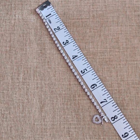 925 Silver Sparkling Tennis Bracelet with Heart Charm - Picture 3 of 10